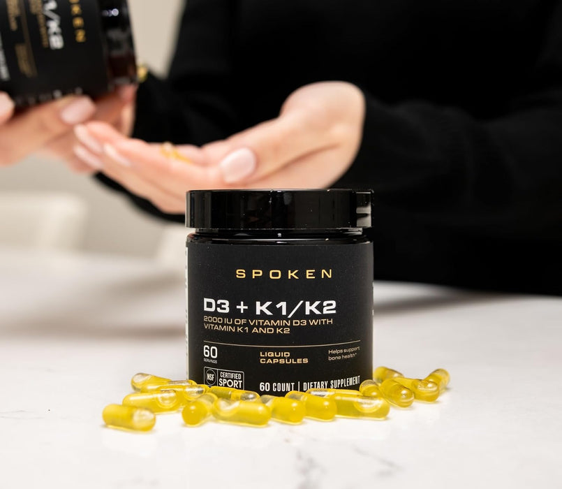 Spoken Nutrition D3 + K1/K2 vitamins shown in a wellness setting – bone density, immune, and cardiovascular support supplement.