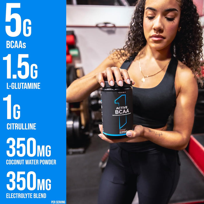 Athlete drinking Rule 1 Active BCAA during workout for hydration and recovery support 30 Servings